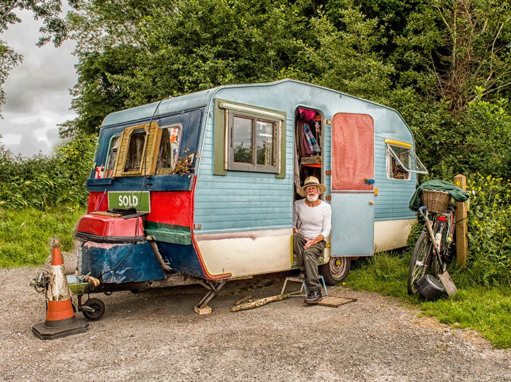 Man with old camper